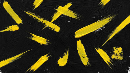 Abstract acrylic paint brush strokes background in yellow and black colors. Fragment of artworkの素材