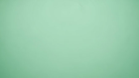 Green pastel soft paper texture background with copy space for text or imageの素材