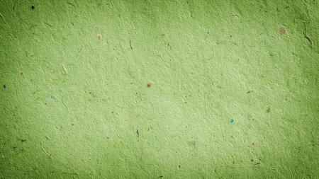 Green paper texture or background for design with copy space for text or image.の素材