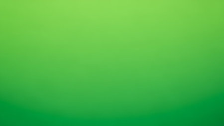 Green abstract background. Blurred bokeh lights. Green background.の素材