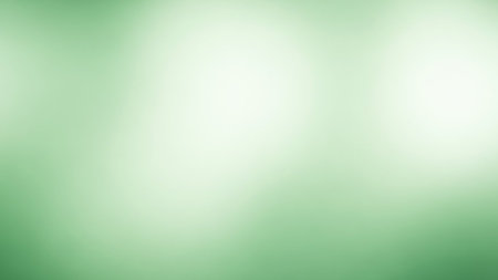 Green blurred abstract background with bokeh defocused lights and shadowの素材