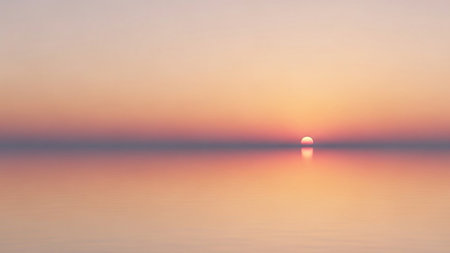 Sunset over the sea with reflection in the water. Abstract background.の素材