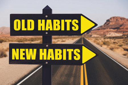 Old habits new habits signpost on desert road with text: Old habits new habitsの写真素材