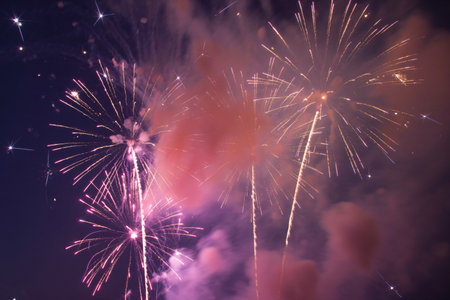 Colorful fireworks of various colors over night sky, celebration and anniversary conceptの写真素材