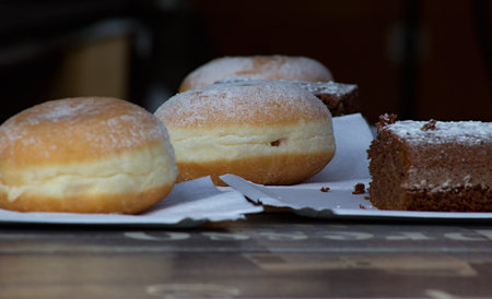Fresh Czech donuts sprinkled with sugar ready for saleの写真素材