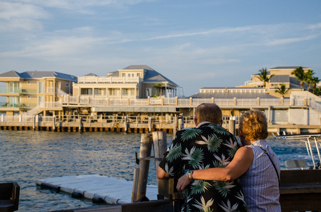 An elderly couple by the oceanの写真素材