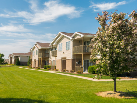 Rows of new apartments on a bright sunny dayの写真素材