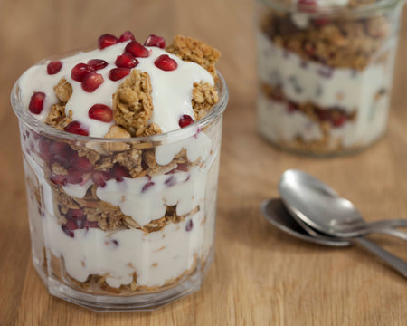 Healthy Parfait Granola Yogurt and Pomegranate Seedsの写真素材