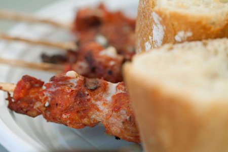 Skewered Lamb Meat with Bread for Appetiser at Festival with Moroccan Spicesの写真素材