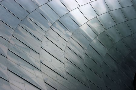 Square tiled metal slope reflecting backgroundの写真素材