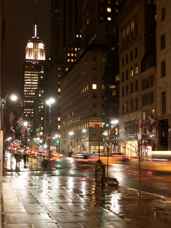 5th avenue and Empire State building by night under the rain, New Yorkの写真素材