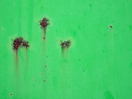 Rusty green painted metal backgroundの写真素材
