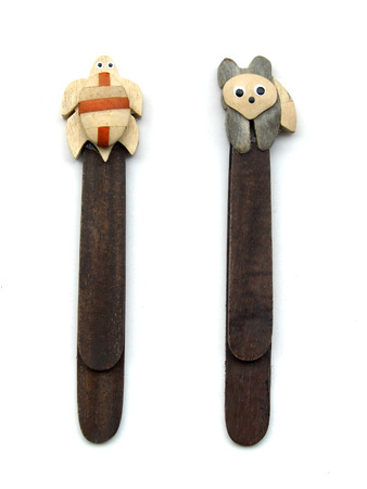 Wooden bookmarks with funny animals, isolated on white backgroundの写真素材