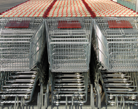 Shopping carts parked in three rows, front viewの写真素材