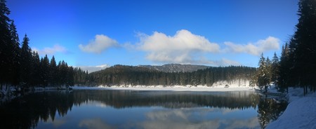 Panoramic winter view of lower lake in Fusine, Friuli, Italyの写真素材