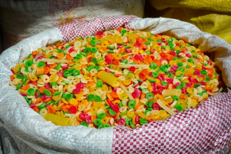 Raw colorful pasta for sale in a market in Bikaner, Rajasthan, Indiaの写真素材