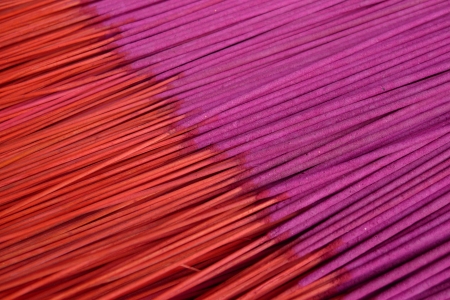 New red and magenta incense sticks in a temple in Pingyao, Chinaの写真素材