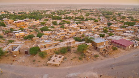 Aerial evening view of the city of Jaisalmer facing the desert, Rajasthan, India  Because of the...