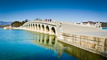 The Seventeen Arch Bridge over Kunming Lake in the Summer Palace complex, Beijing, China.の写真素材