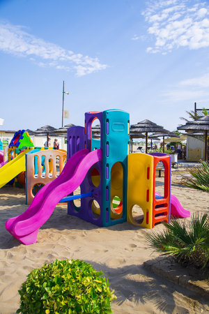 Playground on the beach in summer in Rimini, Italy.の写真素材