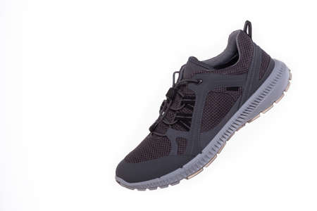 Gray sneakers on a white background. Copy Space.の写真素材