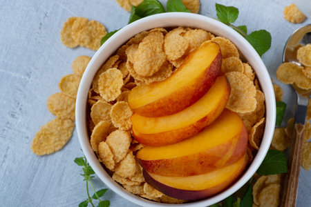 A delicious Breakfast cereal and peach