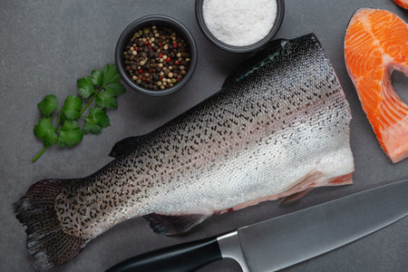 Fresh raw salmon cooking. Fish steak with herbs and spices