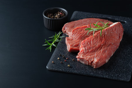 Fresh raw beef steak sirloin with rosemary