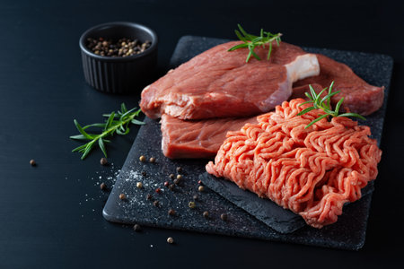 Fresh raw minced meat and cuts of beef, minced meatの写真素材