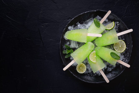 Homemade ice pop with lime juice and mint, mojito fruit ice