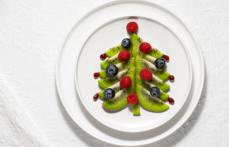 Funny edible Christmas tree, Christmas breakfast idea for kids. Copy space for textの写真素材