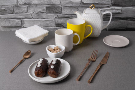 Potato cake in a white plate on a gray table