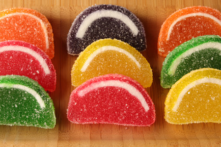 close-up black background mixed color fruit flavored sweet soft candy