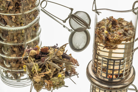 Antioxidant healthy hot cold winter tea brewed in dry bench press in close-up studio concept jar
