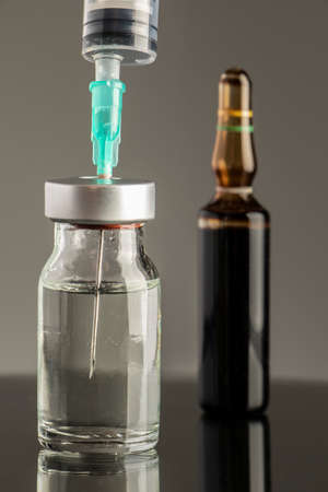 close-up studio concept vaccine material medicine bottle ampoule needle injectorの写真素材