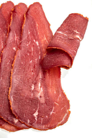 Close-up detail studio red meat sliced lined up fenugreek stripped local kayseri ribeye baconの写真素材