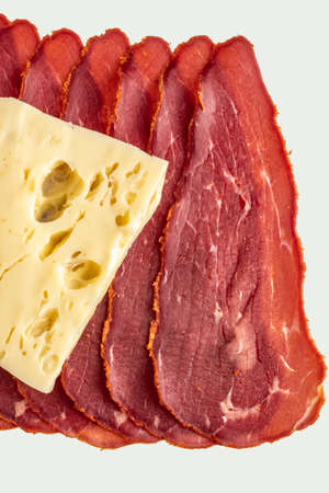 Close-up detail studio red meat sliced lined up fenugreek stripped local kayseri ribeye baconの写真素材