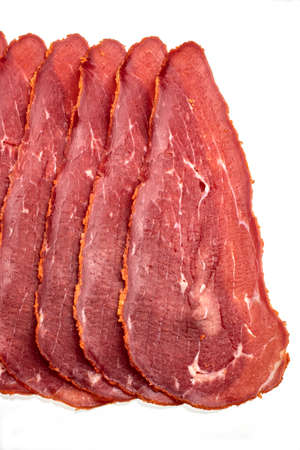 Close-up detail studio red meat sliced lined up fenugreek stripped local kayseri ribeye baconの写真素材