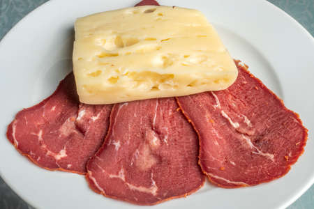 Close-up detail studio red meat sliced lined up fenugreek stripped local kayseri ribeye baconの写真素材