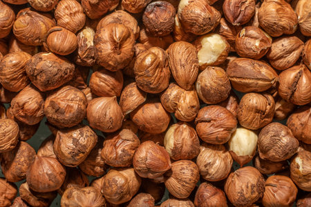 close-up top view group of aromatic shelled unshelled fresh hazelnuts of black sea region