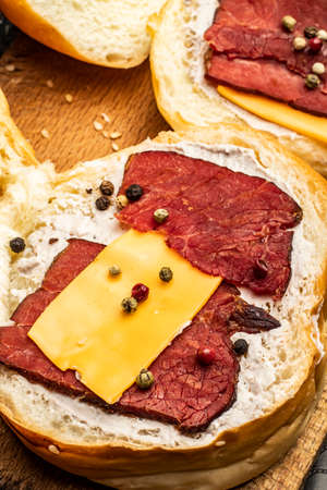 close-up of fried red meat slices on the grillの写真素材