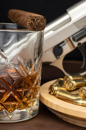group of close-up 9mm revolver pistols and bullets