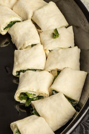 close-up detail of spinach cheese pie made from phyllo in a tray