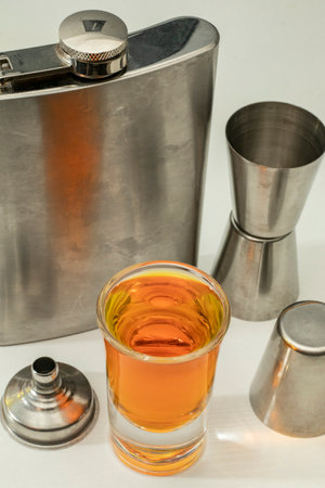 stainless steel pocket flask set and shot glassesの写真素材