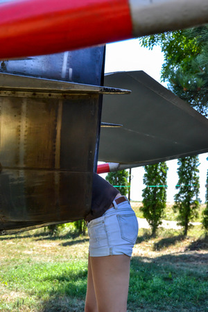 Woman repairing jet engineの写真素材