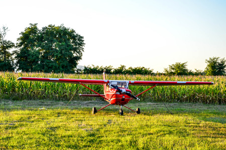 Airplane grounded on airfieldの写真素材