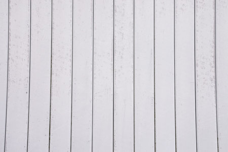 Ugly dirt old white steel sheets on building wall