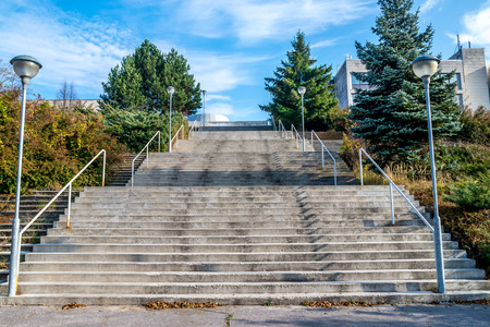 High concrete stairs to public sport building complex at November, in Bratislava, Slovakiaの写真素材