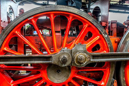 Classic steam engine red spoke wheel, detail