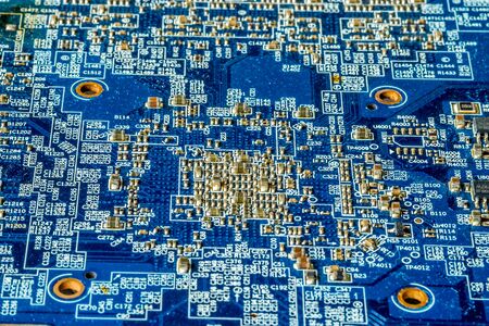 Blue printed curcuit board PCB for computer components with electronic elementsの写真素材
